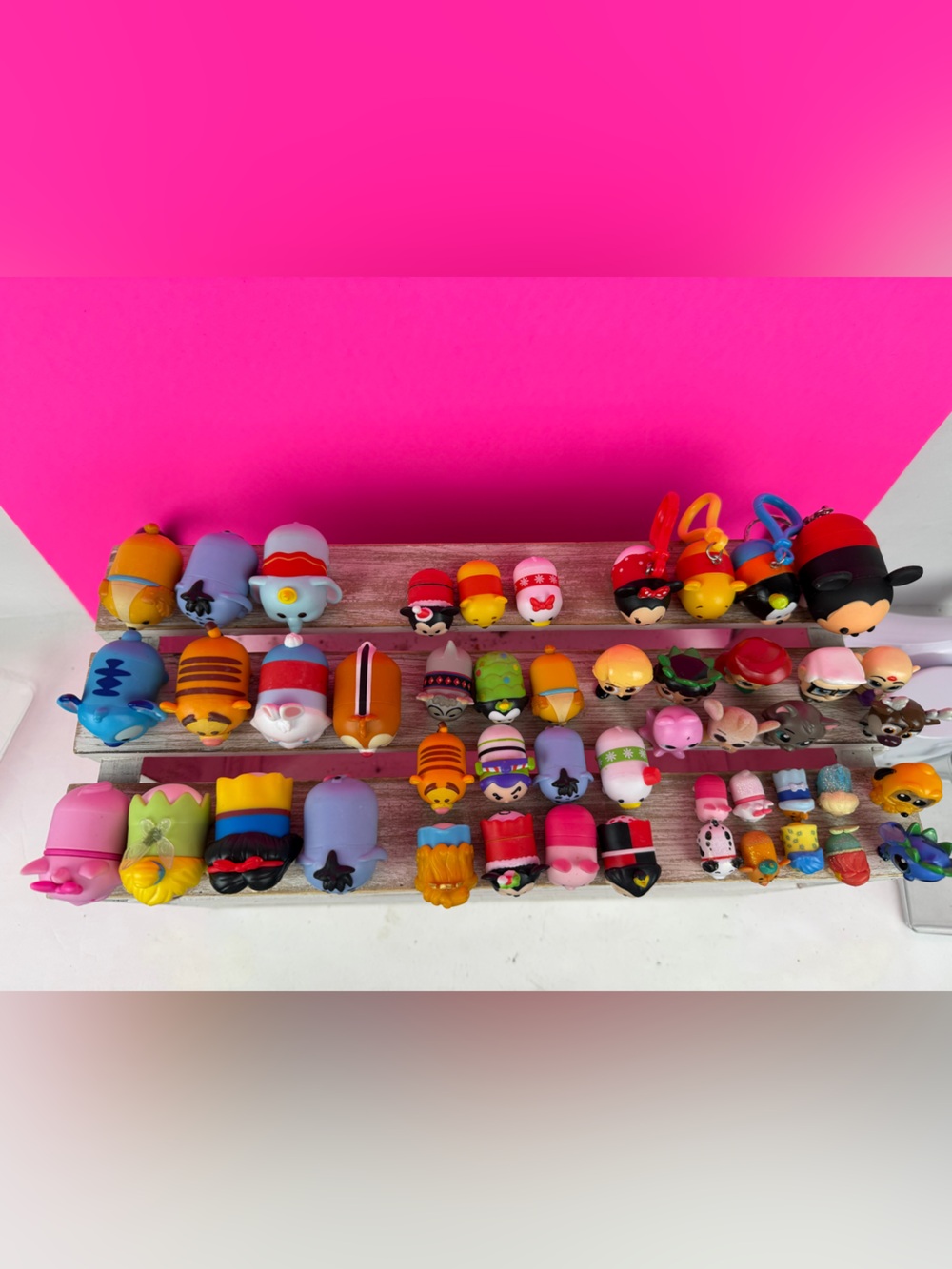 Disney Tsum Tsum vinyl mini figures in various sizes.